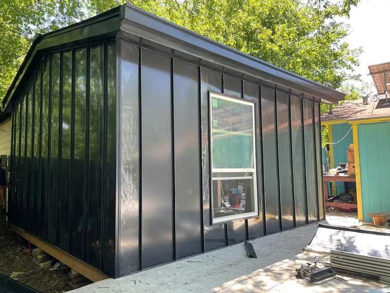 Black standing seam metal wall panels for Metal Roof Installation in Castle Pines