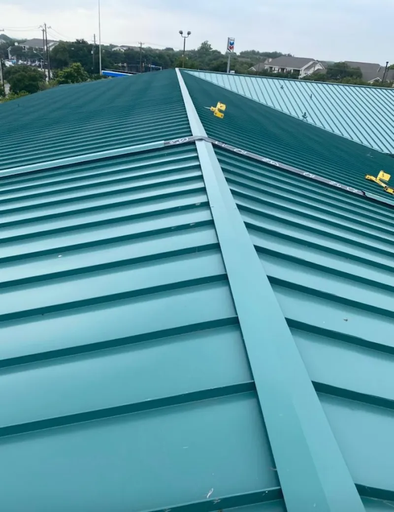 Green commercial metal roof ridge and valley for Metal Roof Repair in Castle Pines