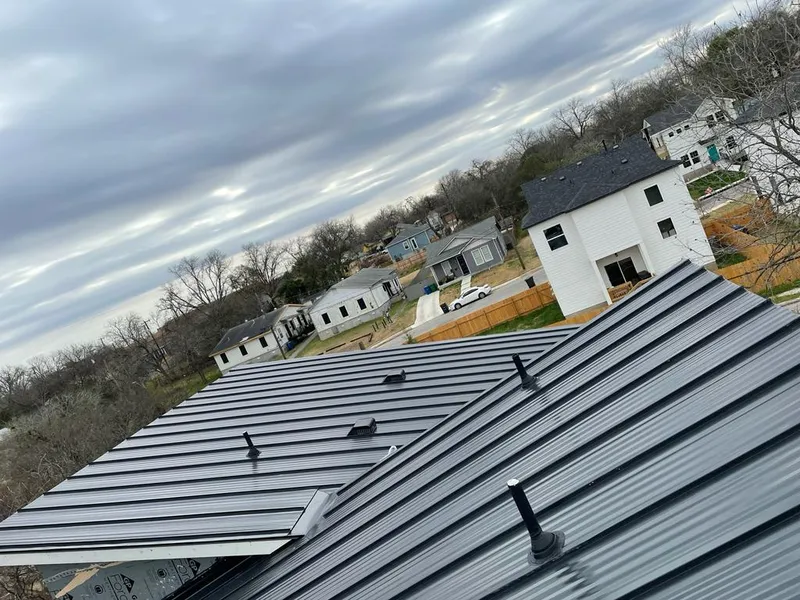 Standing seam metal roof panels with vents for Skylight Repair in Castle Pines